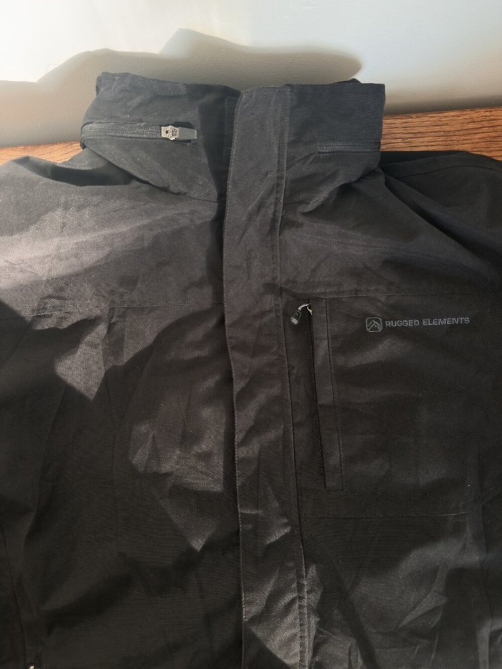MEN'S RUGGED ELEMENTS XXL RAIN JACKET WITH BUILD IN STOW AWAY HOOD